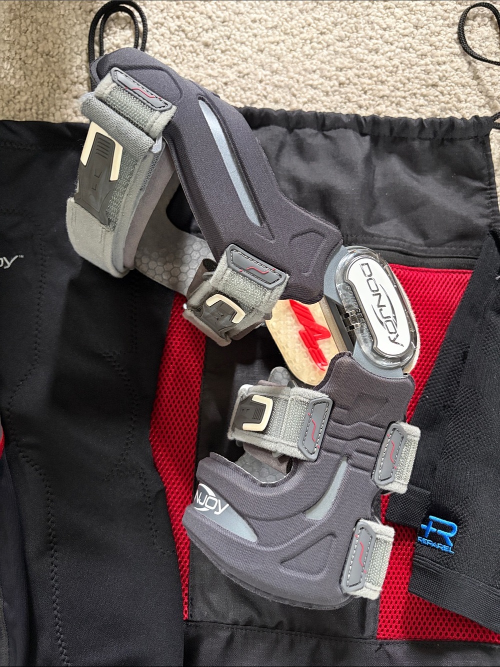 DonJoy Hinged Knee Brace in Charcoal Gray with Light Gray Straps